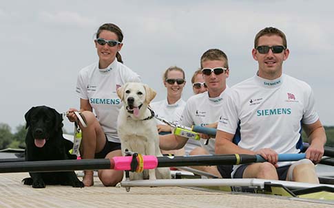 Image of GB Rowers Adaptive Crew with Guide Dogs